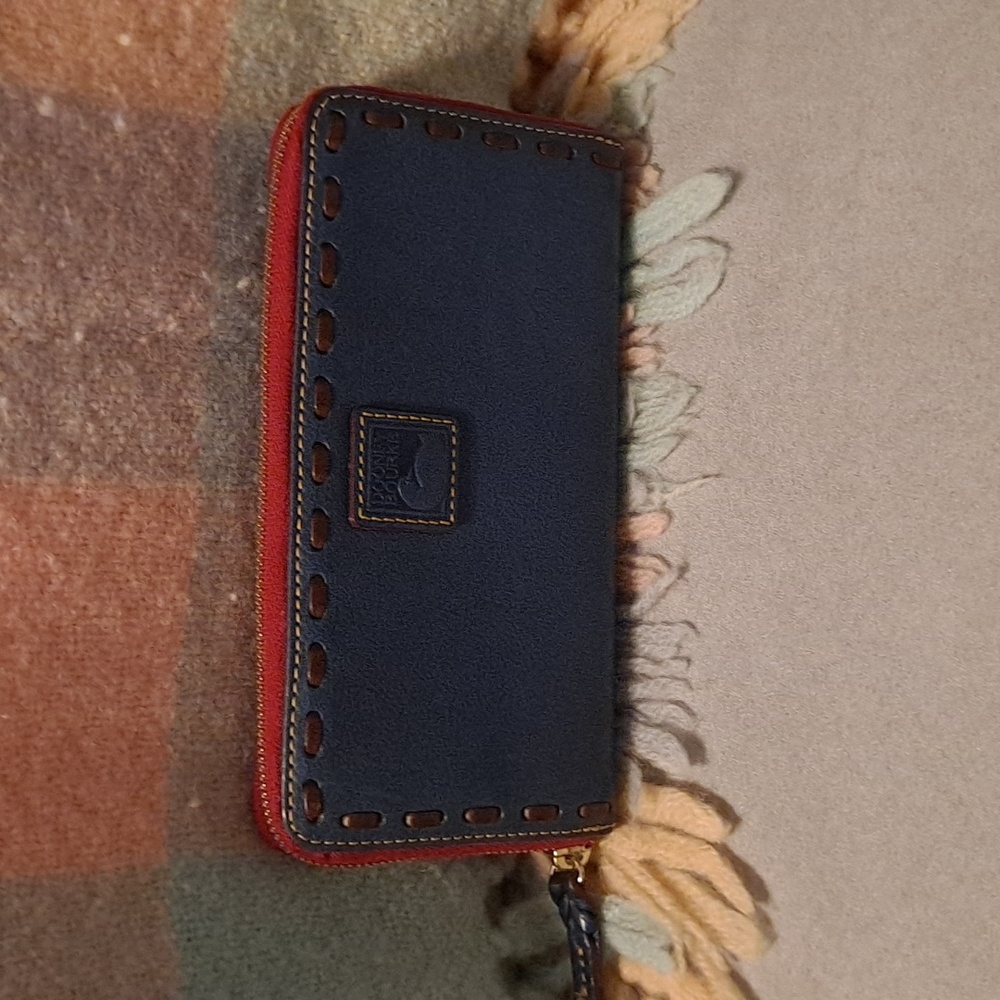 Dooney and Bourke Large zip around wallet in Ocean blue Florentine leather